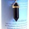Abundance pillar candle with Blue Sandstone pendant Abundance pillar candle with Blue Sandstone pendant