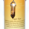 Prosperity pillar candle with Tiger Eye pendant Prosperity pillar candle with Tiger Eye pendant