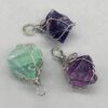 Wire Wrapped Fluorite octahedron Wire Wrapped Fluorite octahedron